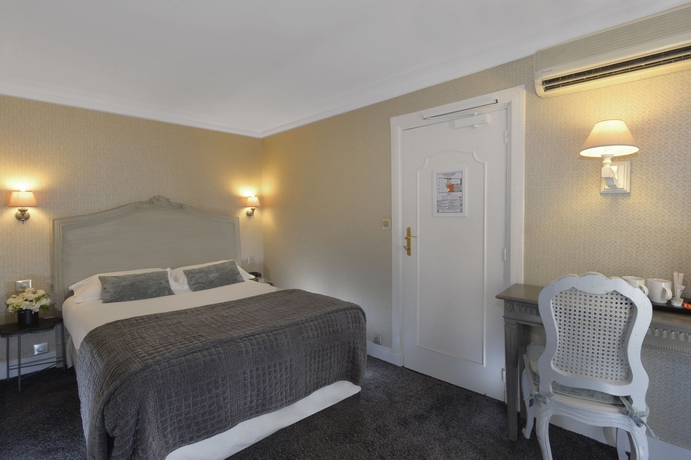 Imagen de la habitación del Hotel Louvre Montana. Foto 5