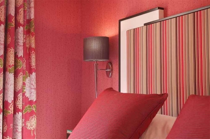 Imagen de la habitación del Hotel Louvre Saint-Honoré. Foto 7