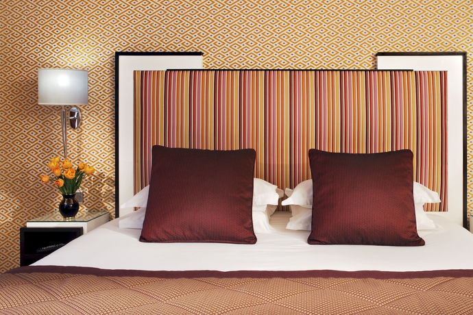 Imagen de la habitación del Hotel Louvre Saint-Honoré. Foto 8