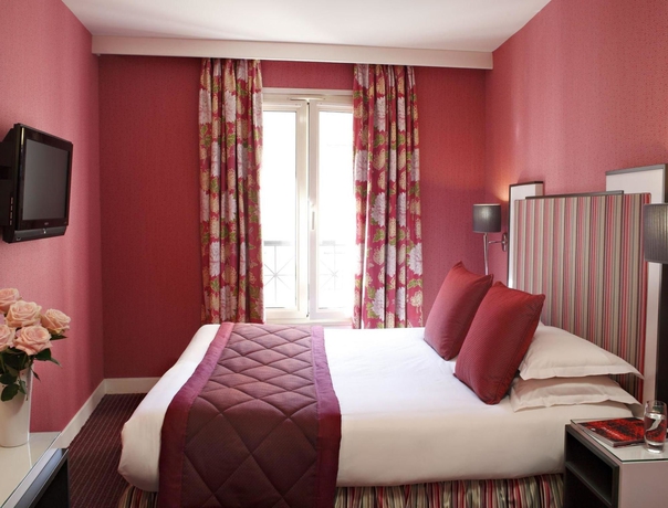 Imagen de la habitación del Hotel Louvre Saint-Honoré. Foto 11