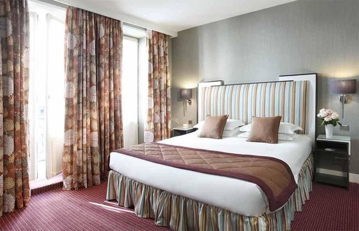 Imagen de la habitación del Hotel Louvre Saint-Honoré. Foto 12