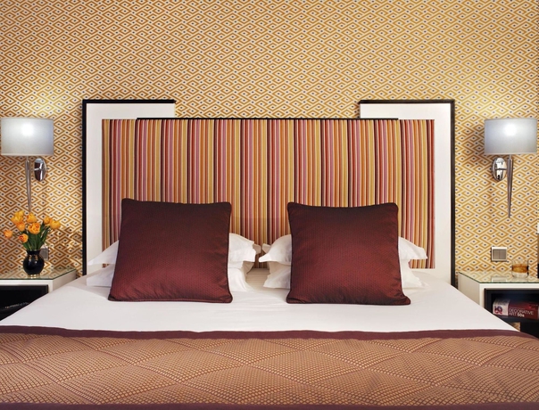 Imagen de la habitación del Hotel Louvre Saint-Honoré. Foto 13