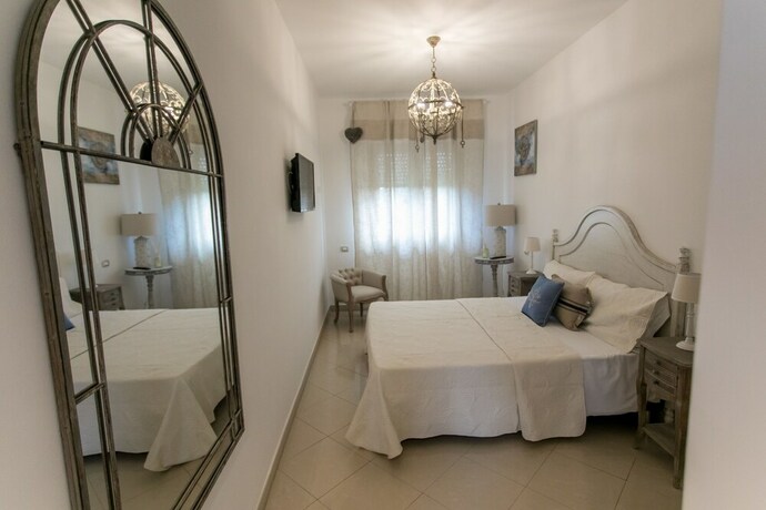 Imagen de la habitación del Hotel Love Fama. Foto 19