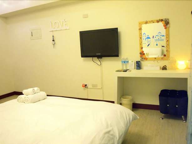 Imagen de la habitación del Hotel Love Fenjia Colorful. Foto 2