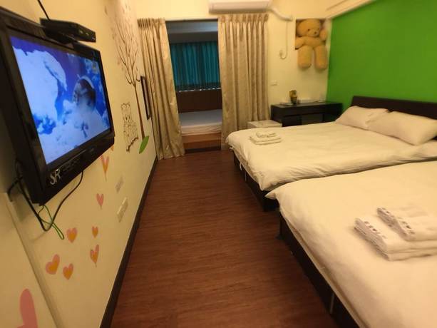 Imagen de la habitación del Hotel Love Fenjia Colorful. Foto 11