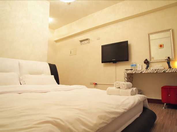 Imagen de la habitación del Hotel Love Fenjia Colorful. Foto 14