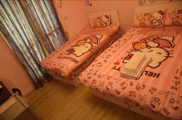 Imagen de la habitación del Hotel Love Fenjia Colorful. Foto 17