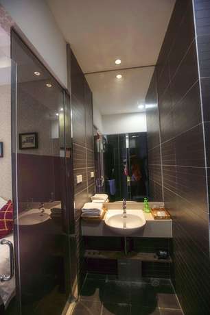 Imagen de la habitación del Hotel Love Holiday Inn apartment. Foto 3