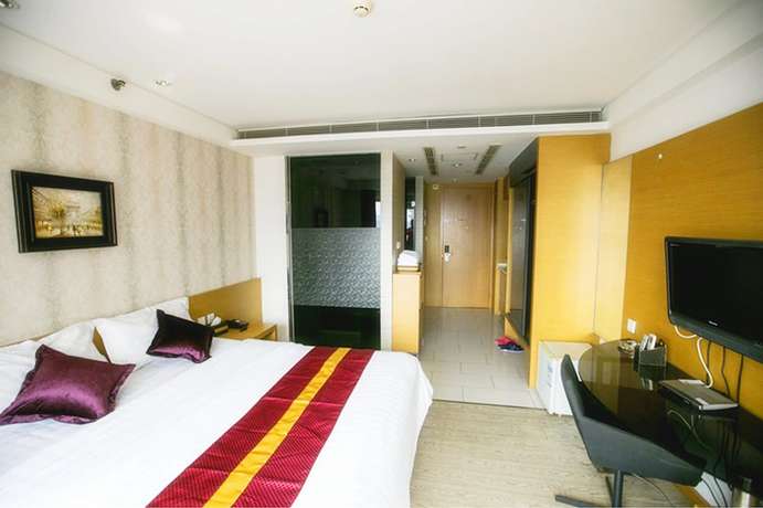 Imagen de la habitación del Hotel Love Holiday Inn apartment. Foto 5