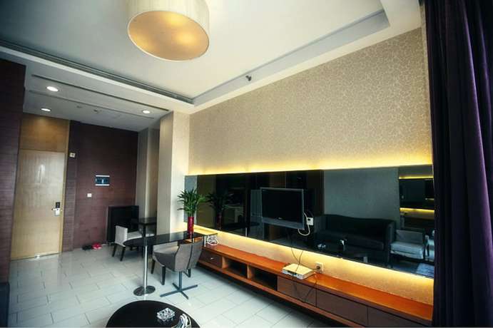 Imagen de la habitación del Hotel Love Holiday Inn apartment. Foto 7