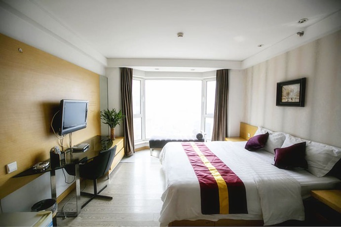 Imagen de la habitación del Hotel Love Holiday Inn apartment. Foto 14