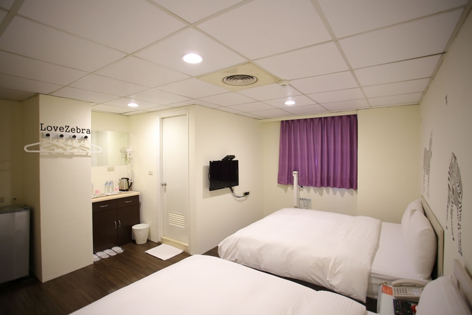 Imagen de la habitación del Hotel Love House Inn. Foto 7