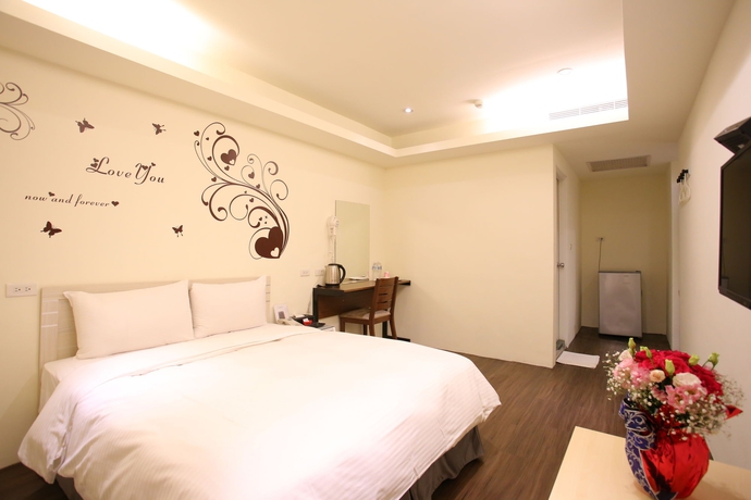 Imagen de la habitación del Hotel Love House Inn. Foto 8