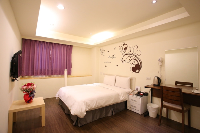 Imagen de la habitación del Hotel Love House Inn. Foto 10