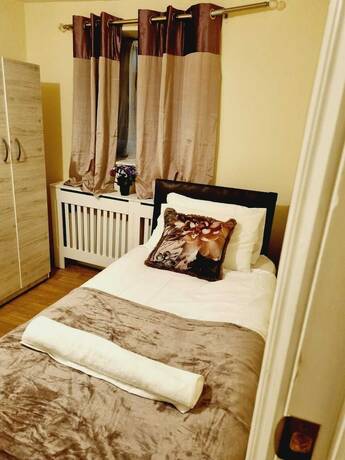 Imagen general del Hotel Lovely 5-bed House in Romford, Greater London. Foto 4