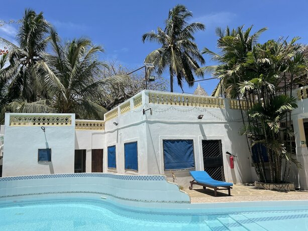 Imagen general del Hotel Lovely 5-bed Room House With a Swimming Pool. Foto 11
