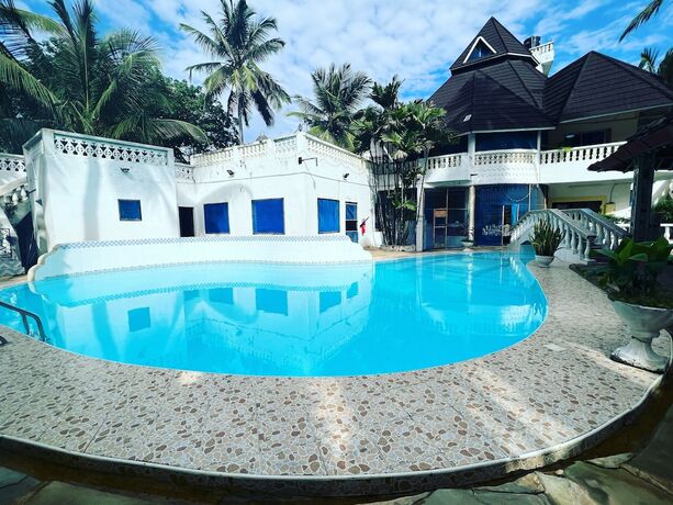 Imagen general del Hotel Lovely 5-bed Room House With a Swimming Pool. Foto 14