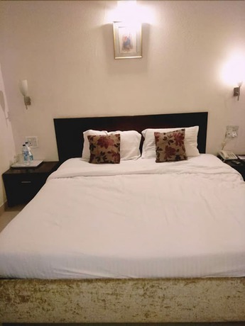 Imagen de la habitación del Hotel Lovely Palace. Foto 7