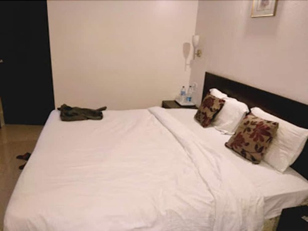 Imagen de la habitación del Hotel Lovely Palace. Foto 10