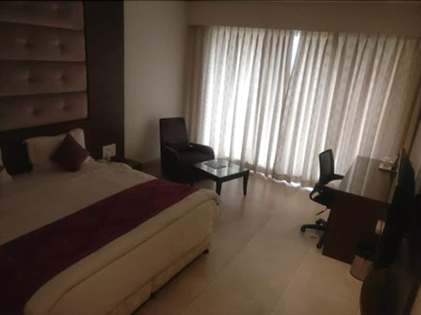 Imagen de la habitación del Hotel Lovely Palace. Foto 14