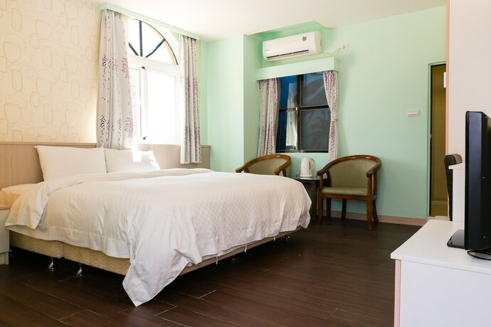 Imagen de la habitación del Hotel Loveme Resort. Foto 17