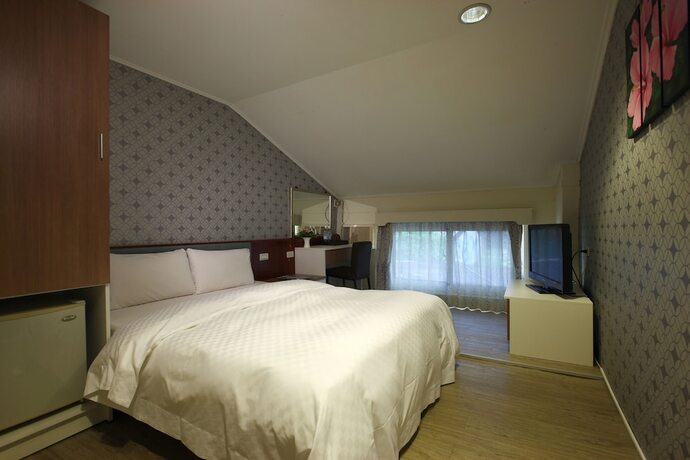 Imagen de la habitación del Hotel Loveme Resort. Foto 21