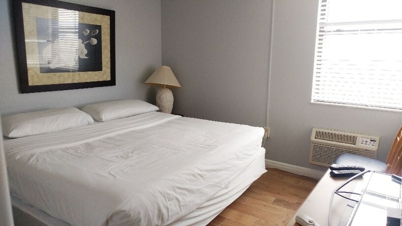 Imagen de la habitación del Hotel Lovers Key Beach Club by Check In Vacation Rentals. Foto 13