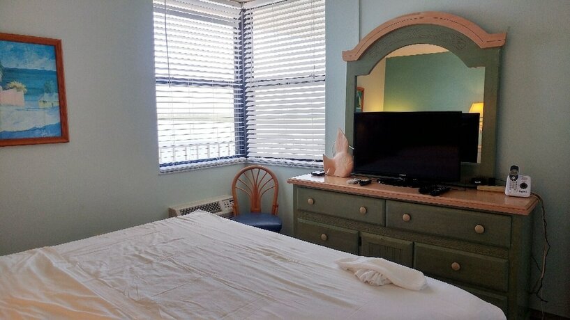 Imagen de la habitación del Hotel Lovers Key Beach Club by Check In Vacation Rentals. Foto 19