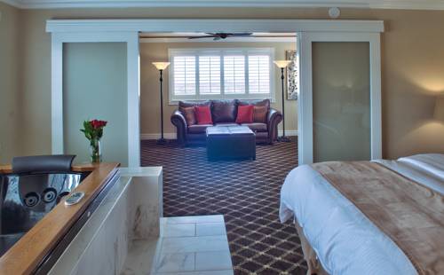 Imagen de la habitación del Hotel Lovers Point Inn. Foto 7