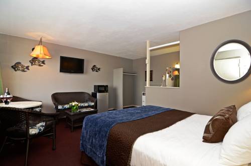 Imagen de la habitación del Hotel Lovers Point Inn. Foto 16