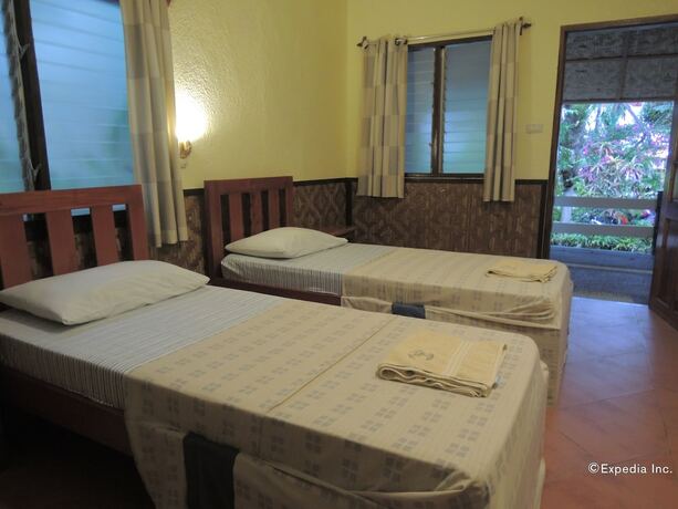 Imagen de la habitación del Hotel Love\'s Beach and Dive Resort. Foto 15