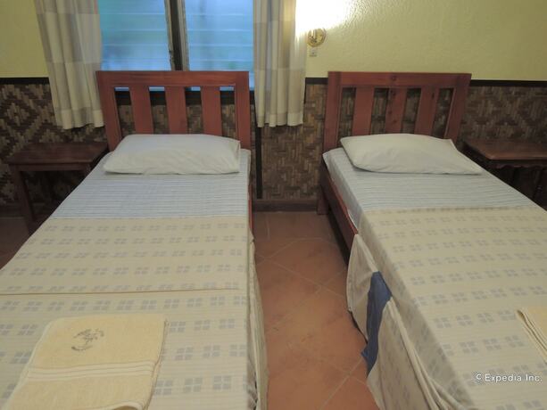 Imagen de la habitación del Hotel Love\'s Beach and Dive Resort. Foto 16