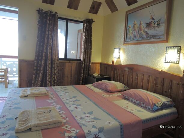 Imagen de la habitación del Hotel Love\'s Beach and Dive Resort. Foto 17