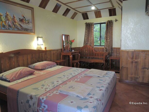Imagen de la habitación del Hotel Love\'s Beach and Dive Resort. Foto 19