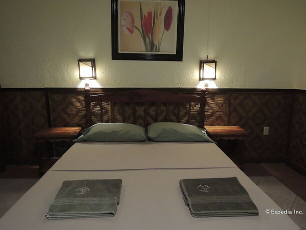 Imagen de la habitación del Hotel Love\'s Beach and Dive Resort. Foto 20