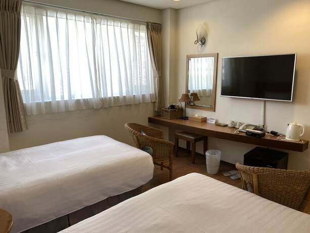 Imagen de la habitación del Hotel Lovesea 126 House Inn. Foto 24