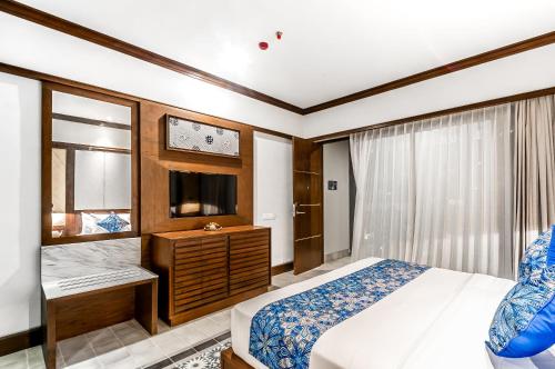 Imagen de la habitación del Hotel Lovina Beach Club and Resort. Foto 7