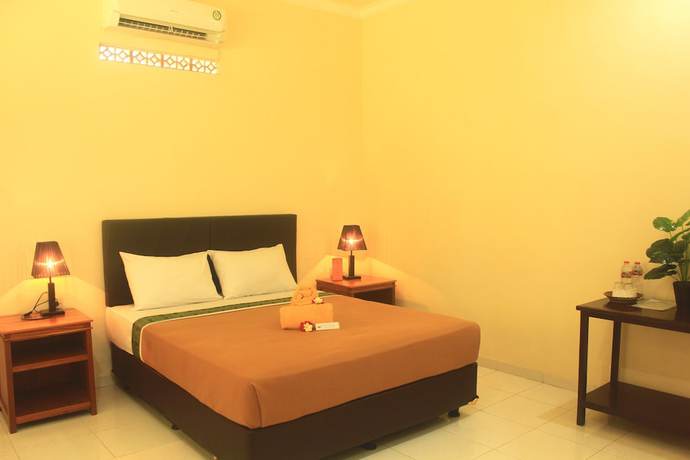 Imagen de la habitación del Hotel Lovina Beach. Foto 8