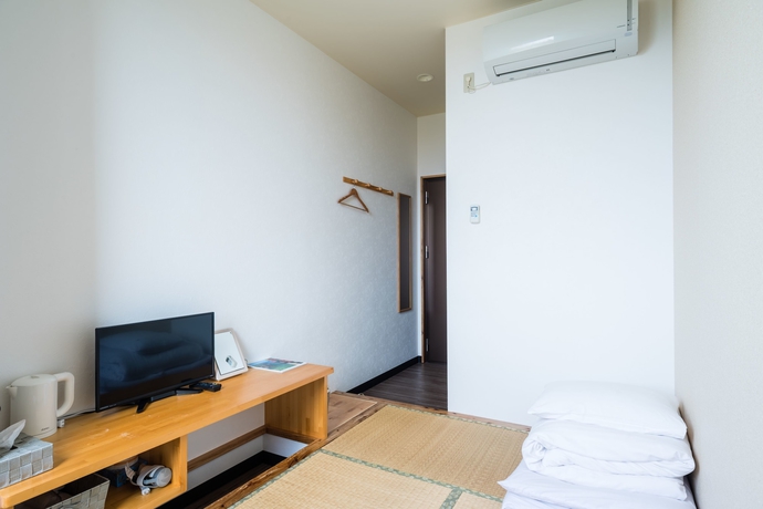 Imagen de la habitación del Hotel Low Cost Resort Manza Beach. Foto 9