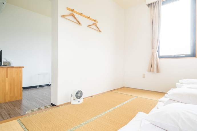 Imagen de la habitación del Hotel Low Cost Resort Manza Beach. Foto 12