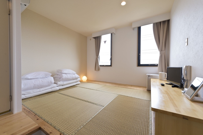 Imagen de la habitación del Hotel Low Cost Resort Manza Beach. Foto 14