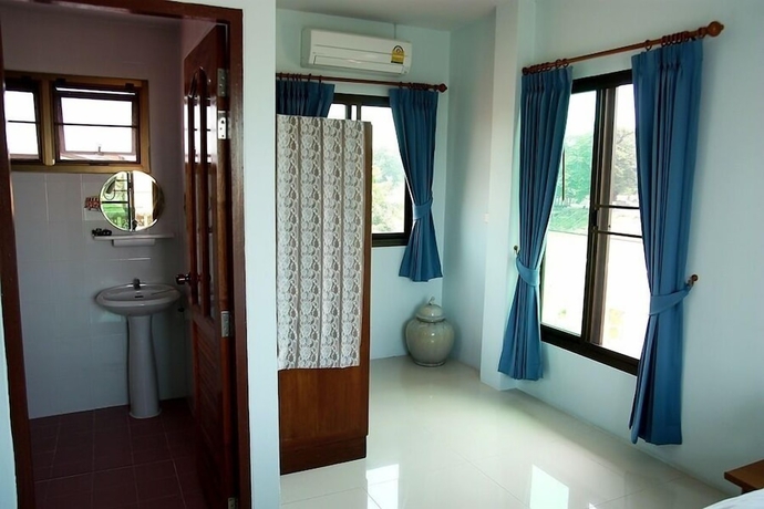 Imagen de la habitación del Hotel Loy Manee House. Foto 11