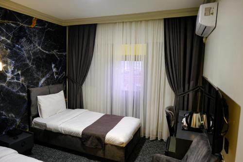 Imagen general del Hotel Loyalcity. Foto 14
