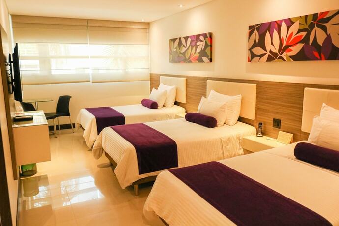 Imagen de la habitación del Hotel Loyds. Foto 15