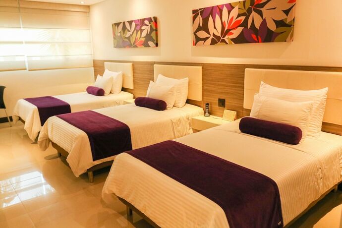 Imagen de la habitación del Hotel Loyds. Foto 29