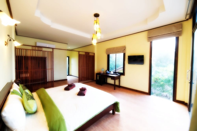 Imagen de la habitación del Hotel Loyfa Natural Resort. Foto 12