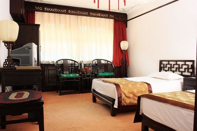 Imagen de la habitación del Hotel Lu Song Yuan. Foto 2