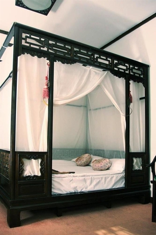 Imagen de la habitación del Hotel Lu Song Yuan. Foto 4