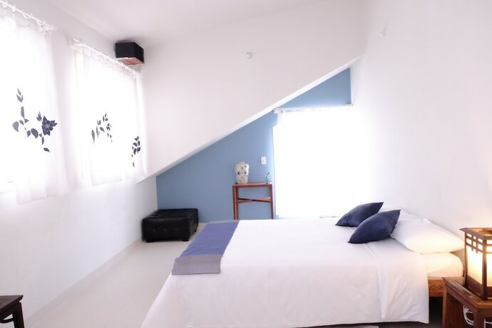 Imagen de la habitación del Hotel Lu Tan Villa. Foto 18