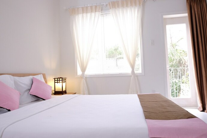 Imagen de la habitación del Hotel Lu Tan Villa. Foto 22